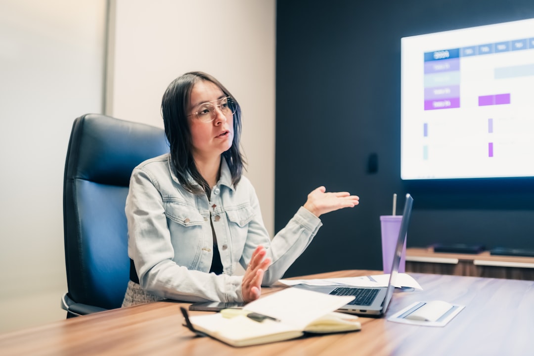 woman-gestures-while-explaining-something-at-a-presentation-ogdr-zfqeu